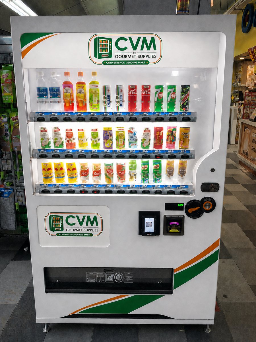 A fully stocked CVM by Gourmet Supplies chilled drinks machine on site in Singapore, shelves lit and full